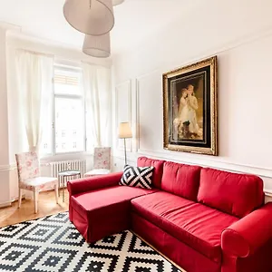 Golden Esthetic With Red Sofa Budapest